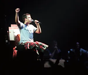 Robbie Williams wearing kilt sitting on toilet February 1999 during SECC concert Glasgow Robbie Williams wearing kilt sitting on toilet February 1999 during SECC concert Glasgow