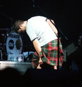 Robbie Williams wearing kilt starting to pull it up February 1999 during SECC concert Robbie Williams wearing kilt starting to pull it up February 1999 during SECC concert