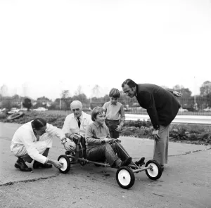 Rober Spicer on the Skid Pan. Skid Pan officials, adjust the Go Kart prior to Robert Rober Spicer on the Skid Pan. Skid Pan officials, adjust the Go Kart prior to Robert