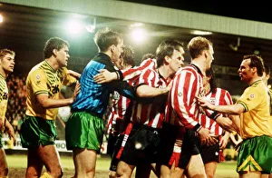 Robert Fleck Calms the Southampton boys down in the game between Norwich Robert Fleck Calms the Southampton boys down in the game between Norwich