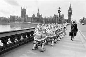 Robots lined up over Westminster Bridge. The robots were supplied by EMI Records who used Robots lined up over Westminster Bridge. The robots were supplied by EMI Records who used