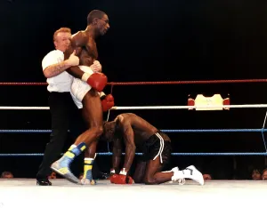 Rod Douglas is knocked down during a fight against Errol Graham at Wembley in 1989 Rod Douglas is knocked down during a fight against Errol Graham at Wembley in 1989