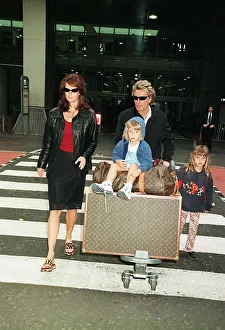Rod Stewart April 1998 with wife Rachel Stewart and Children arriving at Heathrow Rod Stewart April 1998 with wife Rachel Stewart and Children arriving at Heathrow