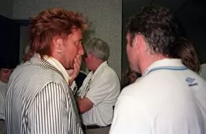 00236 Collection: Rod Stewart pop singer talking to unnamed man Scotland football tour USA pre Euro