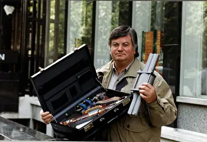 Roger Cook TV Presenter with a bomb device built in a suitcase which he took to Moscow Roger Cook TV Presenter with a bomb device built in a suitcase which he took to Moscow