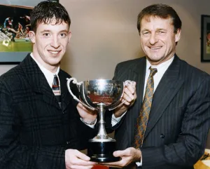 Roger Hunt presents Robbie Fowler with the Echo's Merseyside Sports Personality of Roger Hunt presents Robbie Fowler with the Echo's Merseyside Sports Personality of