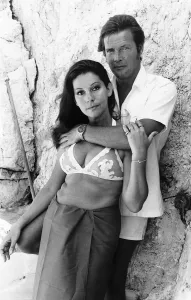 Roger Moore Actorbehind his wife Luisa Mattiolli - June 1972 Dbase MSI Roger Moore Actorbehind his wife Luisa Mattiolli - June 1972 Dbase MSI