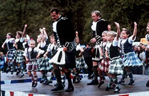 Roger Moore with Michael Caine dancing with children November 1989 Roger Moore with Michael Caine dancing with children November 1989