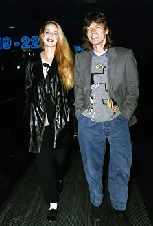 Rolling Stones: Mick Jagger walks with wife actress model Jerry Hall in 1993 Rolling Stones: Mick Jagger walks with wife actress model Jerry Hall in 1993