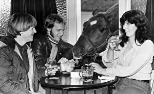 Roman Crumpet the Drinking horse shares a pint with his owners 1977 Roman Crumpet the Drinking horse shares a pint with his owners 1977
