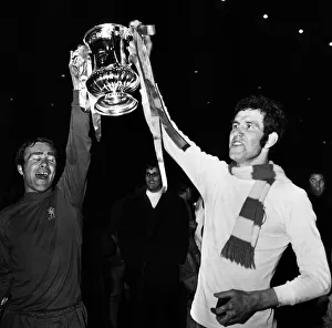 Ron Harris & Peter Osgood of Chelsea holding the FA cup as they celebrate victory against Ron Harris & Peter Osgood of Chelsea holding the FA cup as they celebrate victory against