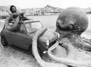 Roy Bella in a Mini battles with an Octopus on beach in Malta stars in film Seven Cities Roy Bella in a Mini battles with an Octopus on beach in Malta stars in film Seven Cities