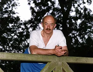 Roy Marsden actor leaning over wooden gate Roy Marsden actor leaning over wooden gate