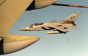 A Royal Air Force Tornado F3 of 43 Squadron extends his refueling probe as he prepares to A Royal Air Force Tornado F3 of 43 Squadron extends his refueling probe as he prepares to