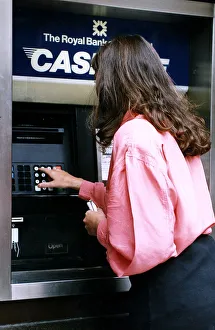 The Royal Bank of Scotland ATM Machine Woman pictured using cashline machine The Royal Bank of Scotland ATM Machine Woman pictured using cashline machine