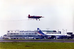 Royal Jordanian Falcons display team land in their Extra EA300 aircraft after performing Royal Jordanian Falcons display team land in their Extra EA300 aircraft after performing