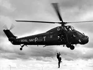 A Royal Navy Westland Wessex helicopter demonstrates search and rescue techniques A Royal Navy Westland Wessex helicopter demonstrates search and rescue techniques