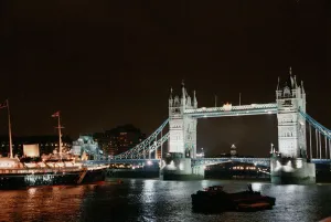 The Royal Yacht Britannia moored at Tower Bridge London The Royal Yacht Britannia moored at Tower Bridge London
