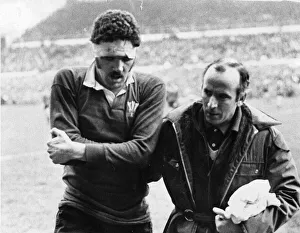 Rugby - Wales v France - March 1972 - Mervyn Davies being led off the pitch with a injury Rugby - Wales v France - March 1972 - Mervyn Davies being led off the pitch with a injury