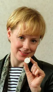 Sally Whittaker and May 1998 Coronation Street actress holding an old 50p Sally Whittaker and May 1998 Coronation Street actress holding an old 50p
