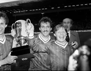Sammy Lee with Alan Kennedy & Phil Neal of Liverpool 1983 with milk cup Sammy Lee with Alan Kennedy & Phil Neal of Liverpool 1983 with milk cup