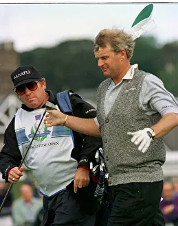 Sandy Lyle golfer hands his driver to his caddy on the final day of the 1996 Scottish Sandy Lyle golfer hands his driver to his caddy on the final day of the 1996 Scottish