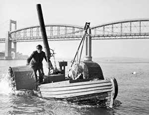 Sandy Pimlott and his Floating Bedstead, a homemade boat with a Morris 8 rear axle Sandy Pimlott and his Floating Bedstead, a homemade boat with a Morris 8 rear axle