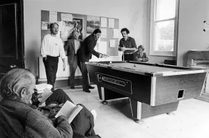 Scenes inside Norton house showing people playing pool in the games room Scenes inside Norton house showing people playing pool in the games room