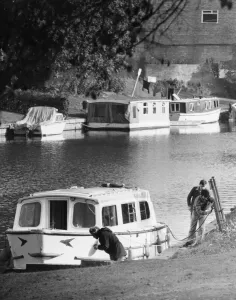 Scenes on the River Cam in Cambridge showing boats being moored. Circa 1975 Scenes on the River Cam in Cambridge showing boats being moored. Circa 1975