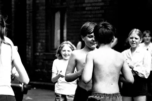 School children take part in a play in the streets of Wallsend School children take part in a play in the streets of Wallsend