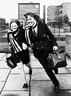 Schoolchildren leave the playground after finishing their maths examination. 1972 Schoolchildren leave the playground after finishing their maths examination. 1972