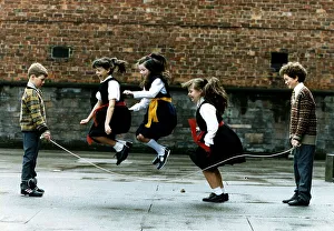 Scotland Street School four children playing skipping jumping ropes Scotland Street School four children playing skipping jumping ropes