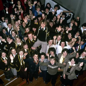 Scottish footballer Asa Hartford of Manchester City, pictured with pupils at his old Scottish footballer Asa Hartford of Manchester City, pictured with pupils at his old
