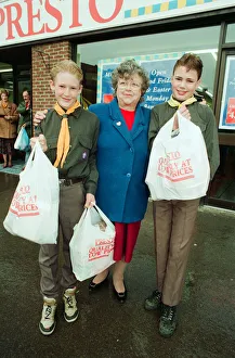 Scouts Jobweek at Stokesley. 9th April 1993. Mrs Norma Wilson is grateful for a little Scouts Jobweek at Stokesley. 9th April 1993. Mrs Norma Wilson is grateful for a little