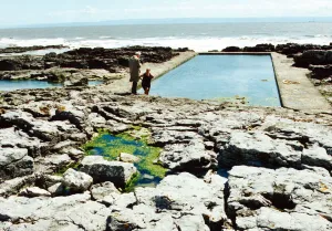 One of the sea water pools, set amongst the rocks, at the Esplanade, Porthcawl front One of the sea water pools, set amongst the rocks, at the Esplanade, Porthcawl front