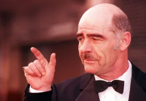 Sean Connery lookalike February 1198 John Garland wearing bow tie pointing finger Sean Connery lookalike February 1198 John Garland wearing bow tie pointing finger