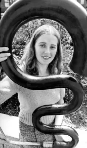 Secretary Ann Roger got to grips with an early musical instrument called the Serpent Secretary Ann Roger got to grips with an early musical instrument called the Serpent