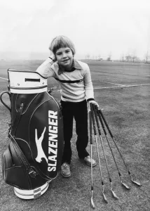 Seven year old Charles Casson stands with his specially made scaled down clubs made for Seven year old Charles Casson stands with his specially made scaled down clubs made for