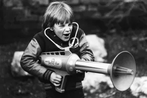 Seven year old Matthew Allen tries out his new sonic laser gun. 29th January 1979 Seven year old Matthew Allen tries out his new sonic laser gun. 29th January 1979