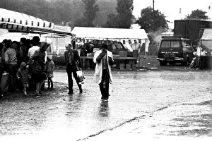 Severe stormy weather with torrential rain and flooding at the annual Summer Exhibition Severe stormy weather with torrential rain and flooding at the annual Summer Exhibition