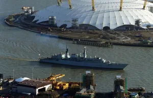 Ships HMS London sails past the Millennium Dome Jan 1999 to her final mooring place Ships HMS London sails past the Millennium Dome Jan 1999 to her final mooring place