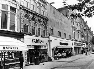The shop frontages opposite Marks and Spencer in Queen Street, Cardiff, Wales The shop frontages opposite Marks and Spencer in Queen Street, Cardiff, Wales