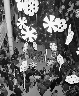 Shoppers admiring the Christmas display in the Broad Street Shopping Centre following Shoppers admiring the Christmas display in the Broad Street Shopping Centre following