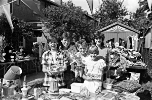 Showing some of the goods at a charity jumble sale on Saturday are (from left Showing some of the goods at a charity jumble sale on Saturday are (from left
