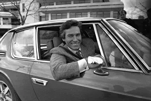 Simon Dutton Actor leans out of the window of an Aston Martin DBS March 1989 Simon Dutton Actor leans out of the window of an Aston Martin DBS March 1989