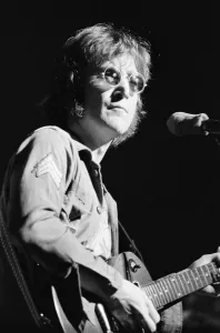 Former singer of The Beatles pop group John Lennon pictured performing on stage during Former singer of The Beatles pop group John Lennon pictured performing on stage during