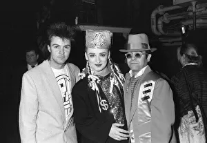 Singer Boy George poses with Paul Young (left) and Elton John (right Singer Boy George poses with Paul Young (left) and Elton John (right