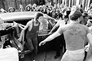 Singer David Bowie as Ziggy Stardust arrives at the stage door of the Odeon in Singer David Bowie as Ziggy Stardust arrives at the stage door of the Odeon in