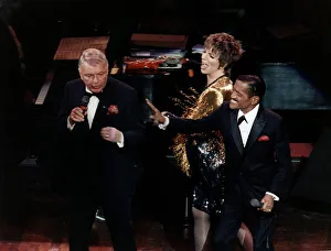 Singer Frank Sinatra on stage with Liza Minnelli and Sammy Davis Jnr performing on stage Singer Frank Sinatra on stage with Liza Minnelli and Sammy Davis Jnr performing on stage