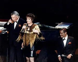 Singer Frank Sinatra on stage with Liza Minnelli and Sammy Davis Jnr performing on stage Singer Frank Sinatra on stage with Liza Minnelli and Sammy Davis Jnr performing on stage